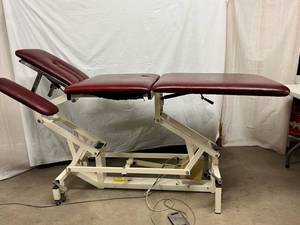 lot 15 image: WOW MSRP $4200 PHYSIOTHERAPY ELECTRIC HILO&nbsp17-37&nbspCHIROPRACTIC 5 SECTION TRACTION TREATMENT TABLE ON CASTERS - MOVEABLE CENTER SECTION, ARMRESTS & HEADREST - LOW ENOUGH FOR WHEELCHAIR TRANSFERS ETC - WORKS GREAT