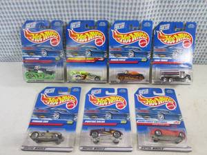 lot 34 image: (C-4) Assorted Hot Wheels in Packag...