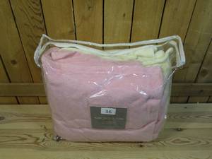 lot 36 image: Cozelle Plush Two Pack Throw - Pink & Cream