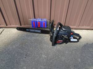 Craftsman 20 chainsaw. Used once. Runs good but wants to die at idle. As shown.