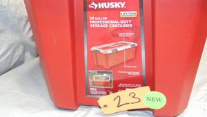 lot 23 image: Husky  30-Gal. Professional Duty Waterproof Storage Container with Hinged Lid in Red