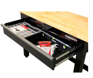 lot 41 image: Husky  4 ft. Solid Wood Top Workbench in Black with Pegboard and 1 Drawer