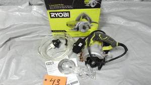 lot 43 image: RYOBI  4 in. WET Tile Saw