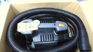 lot 12 image: RIDGID  4 Gallon 5.0 Peak HP Portable WetDry Shop Vacuum with Fine Dust Filter, Locking Hose and Accessories