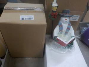 lot 10 image: 2 Snow Man Candles...