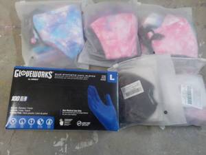 lot 23 image: 100 Vinyl Gloves size L and Face Ma...