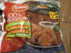 lot 216 image: 4.4 lb. bag Frozen Tyson Chicken Nu...