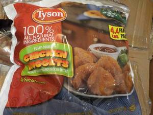lot 218 image: 4.4 lb. bag Frozen Tyson Chicken Nu...