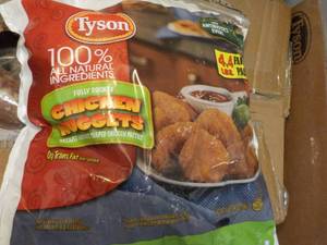 lot 219 image: 4.4 lb. bag Frozen Tyson Chicken Nu...