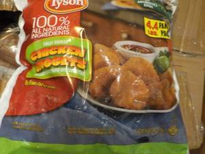 lot 222 image: 4.4 lb. bag Frozen Tyson Chicken Nu...