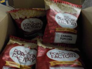 lot 295 image: Case of 2 oz Bags The Popcorn Facto...