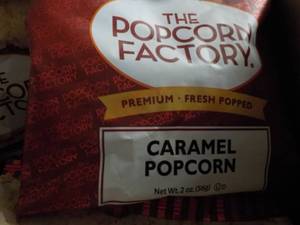 lot 297 image: Case of 2 oz Bags The Popcorn Facto...