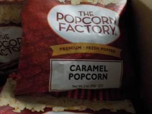 lot 299 image: Case of 2 oz Bags The Popcorn Facto...