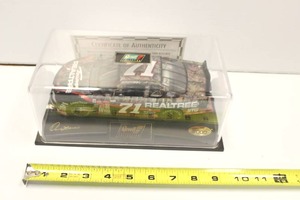 lot 15 image: 124 Scale Diecast Replica Of The 2000 Realtree Chevrolet Monte Carlo Race Car