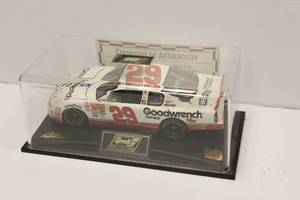 lot 21 image: 124 Scale Diecast Replica Of The 2001 GM Goodwrench Service Plus Chevrolet Monte Carlo