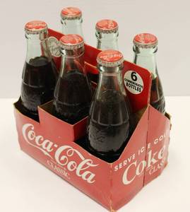 lot 29 image: 6 Pack Coca Cola 6.6 Oz Vintage Unopened Full Bottles