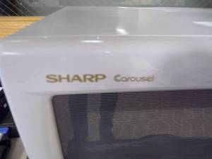 lot 241 image: Sharp Carousel Microwave and Haier Refrigerator