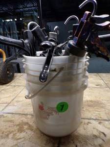 lot 22 image: Bucket Full of Caulking Guns and Supplies