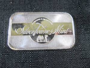 One Troy Ounce .999 Fine Silver Bar...