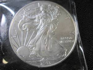 1oz Fine Silver - One Dollar Coin...