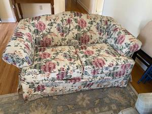lot 2 image: Vintage Loveseat with Pink & Floral Slipcover