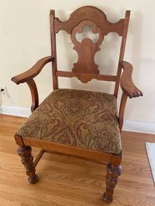 lot 4 image: Vintage Oak Armchair with Carved Wood Details