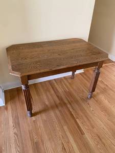 lot 8 image: Oak Stained Table with Unique Carved Legs