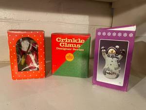 lot 64 image: Santa and Snowman Christmas Figurines