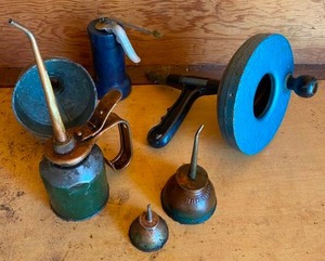 lot 205 image: Drum Auger, Vintage Oil Cans, and More