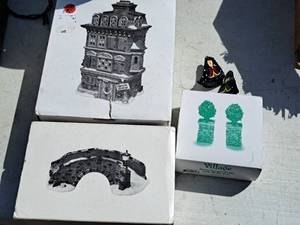 lot 646 image: Lot of (3) Department 56 The Heritage Village Collection Christmas Collectibles (in original packaging) - Stone Bridge, Dickens Village The Flat of Ebenezer Scrooge, Stone Corner Posts with Holly Tree