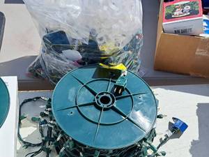 lot 647 image: Lot of  Christmas Dcor - String Lights on Spool with Bag of Wire Clips and Additional String Lights