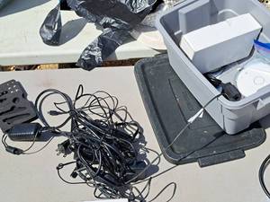 lot 661 image: Lot of (1 Tote) Misc. Electronic Power Cords, Assorted Parts and Accessories