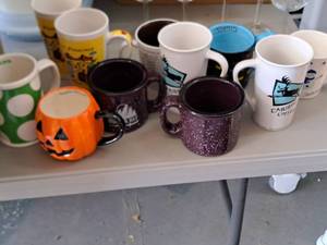 lot 728 image: Lot of (11) Coffee Mugs - Pumpkin, Caribou Coffee, Timber Bay, San Francisco, Atlantis, Happy Holidays