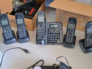 lot 710 image: Panasonic Home Telephone System KX-TG6641 - Five Hand-Held Cordless Phones with Docks