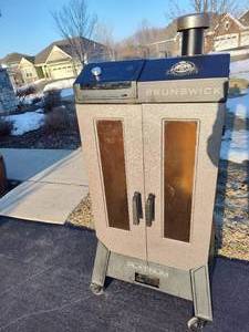 lot 499 image: Pit Boss Platinum Brunswick Wood Pellet Electric Vertical Double-Door Smoker PBV5PL