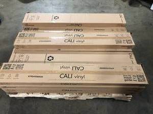 lot 8 image: Pallet of Assorted VPC Saddlewood Vinyl Plank (23.8 sq. ft.case) by CALI (18 Boxes) Customer Returns See Pictures