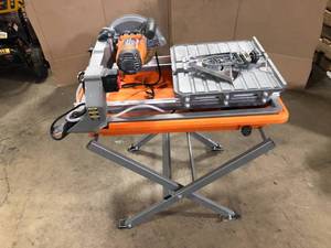lot 9 image: 9 Amp Corded 7 in. Wet Tile Saw with Stand by RIDGID  Customer Returns See Pictures
