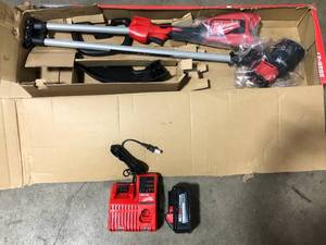 lot 39 image: M18 18V Lithium-Ion Brushless Cordless String Trimmer Kit with 6.0 Ah Battery and Charger by Milwaukee  Customer Returns See Pictures