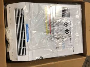 lot 60 image: 6,100 BTU 115-Volt ClearView Ultra Quiet Window Air Conditioner for Small Rooms, Full Window View, Easy Install by GE Profile Customer Returns See Pictures