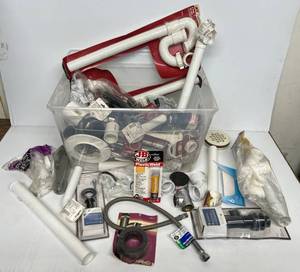 lot 85 image: Tote Full Of Misc. Plumbing Supplies