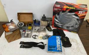lot 202 image: Misc. Auto Parts Some Used And And More  (Vector Hub Caps Only Have Three)