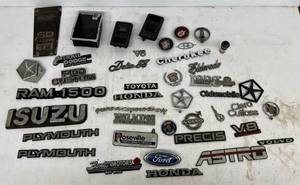 lot 203 image: Group Of Misc. Vintage Automobile Emblems And Parts