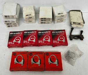 lot 207 image: Group Of Misc. Sizes And Brands Of Muffler Clamps And Rubber Mufflker Hangers And More