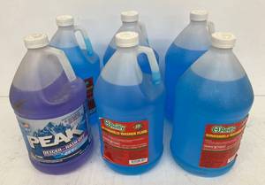 lot 222 image: 5 Gallons Of Oreilly Brand  1 Peak Brand Washer Fluid