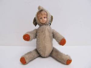 lot 69 image: Early Antique Jointed Mohair Toy - Young Boy in Elephant Costume