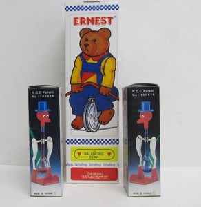 lot 70 image: Brand New in Box Vintage Happy Drinking Birds & Balancing Bear Tin Toy