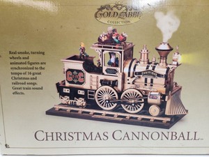 lot 175 image: Gold Metal CHRISTMAS CANNONBALL Musical Train 