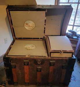 lot 14 image: Large Stamped Metal Camelback Trunk