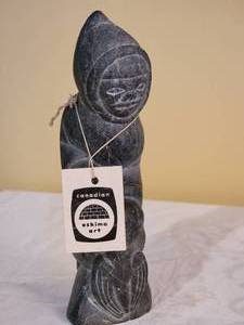lot 178 image: Canada Eskimo Art Carved Stone Standing Man with Seal