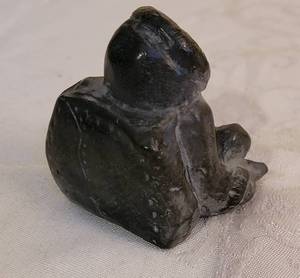 lot 187 image: Canada Nipigon Studio Sculpture Seated Eskimo with Backpack